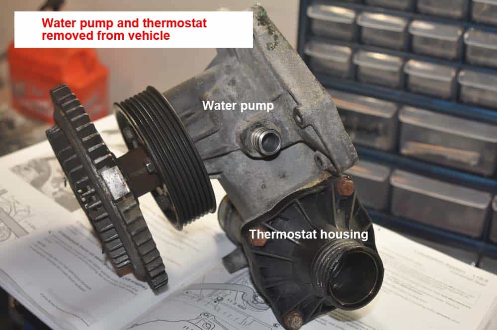 BMW E31 coolant system - old water pump removed from vehicle