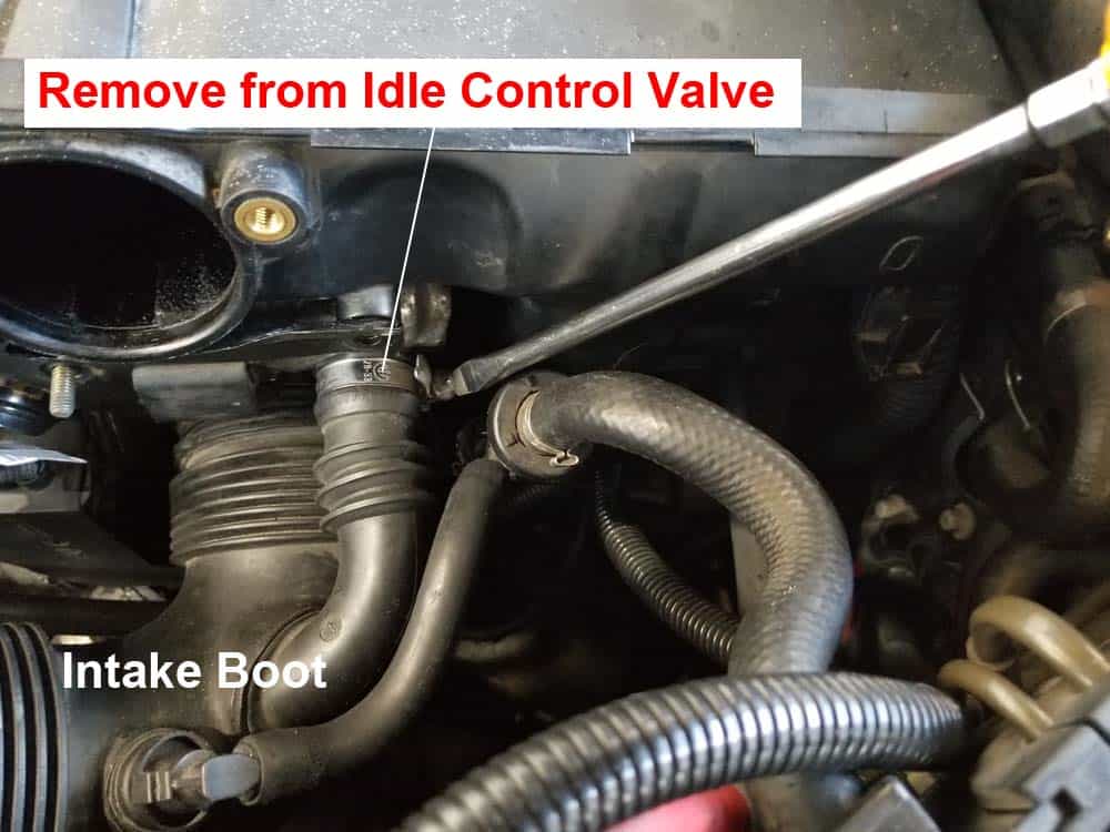 Loosen hose clamp on idle control valve