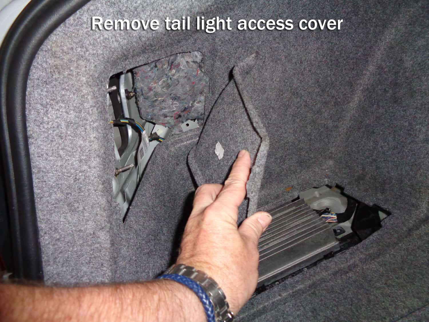 BMW E90 Trunk Leak - remove the tail light access cover