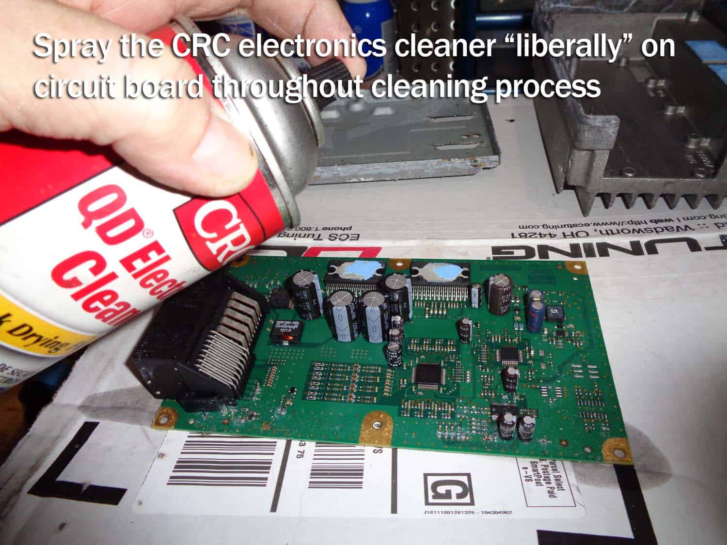 bmw e90 amplifier water damage repair - clean the circuit board with CRC Electronics Cleaner