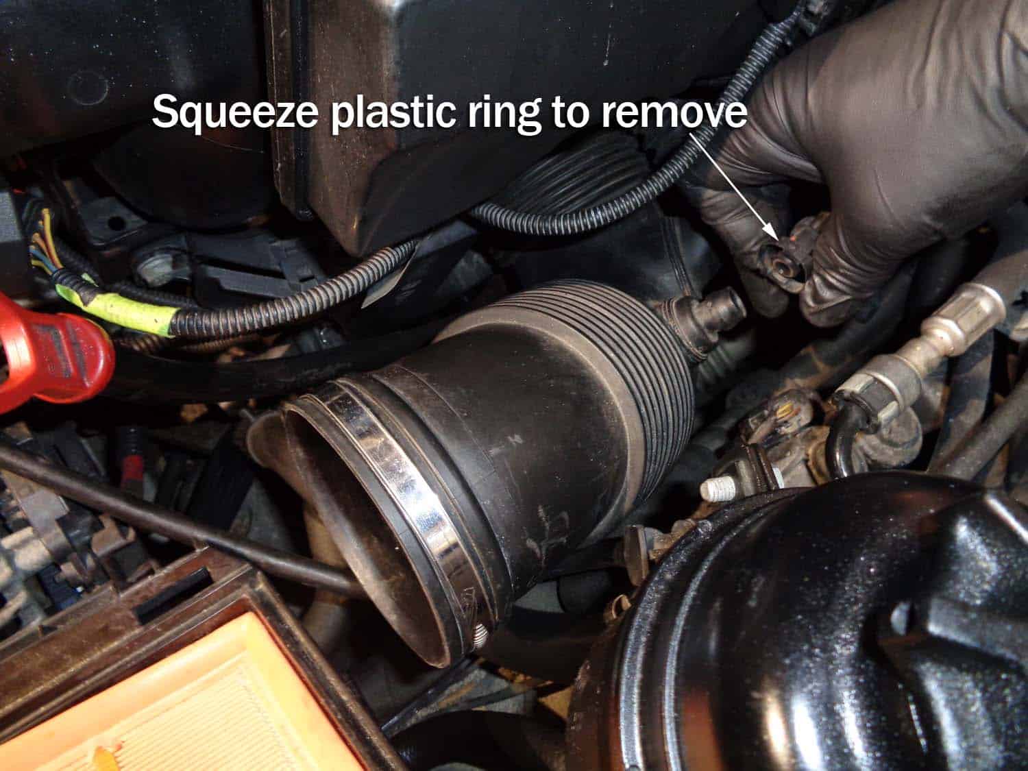 Remove the vacuum line from the intake boot