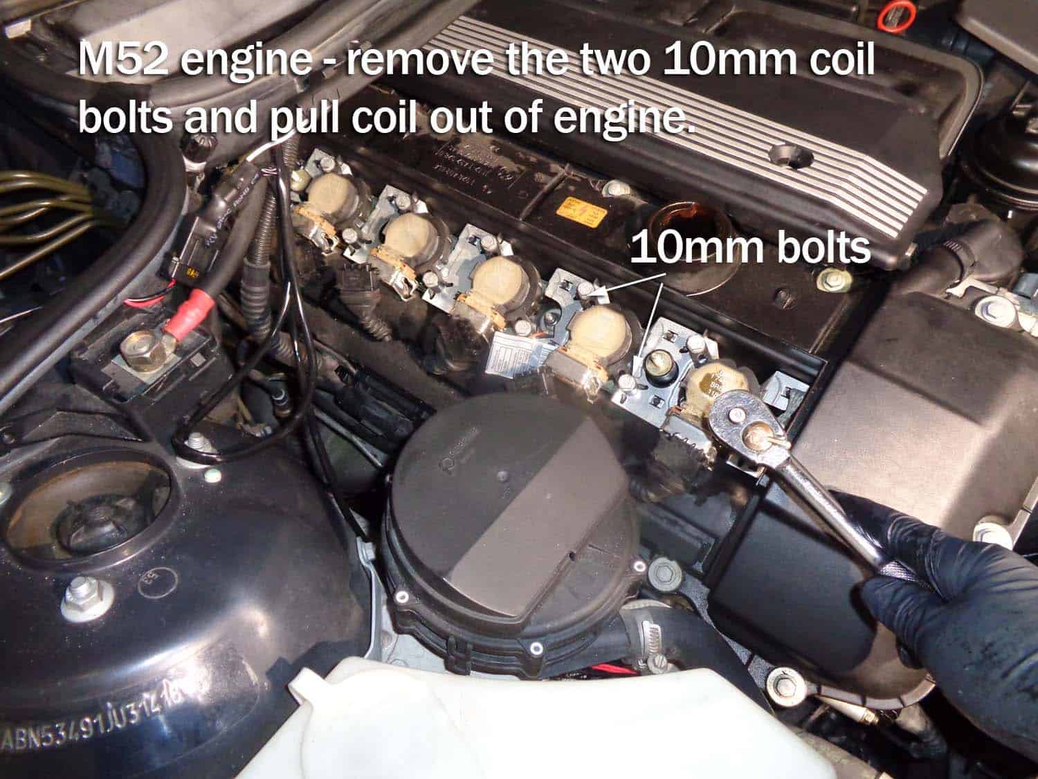 bmw e46 tune up - remove the ignition coils from engine