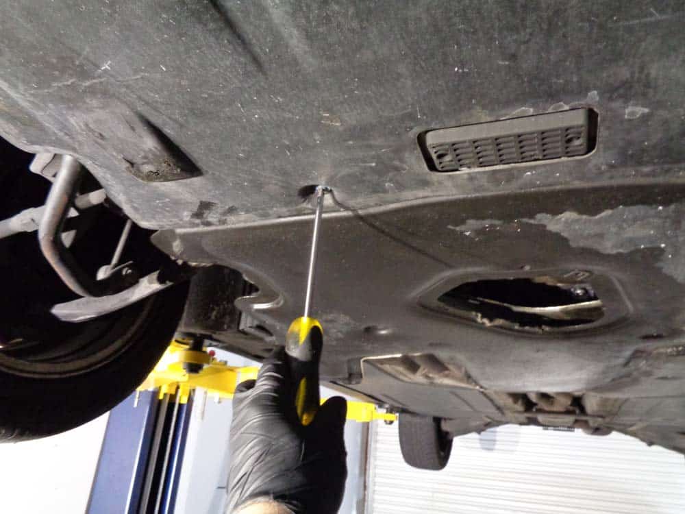 BMW E60 oil level sensor repair - remove the belly pan