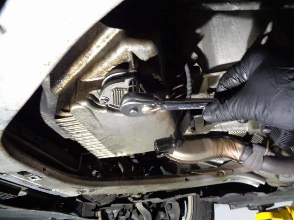 BMW E60 oil level sensor repair - remove the oil sensor mounting nuts