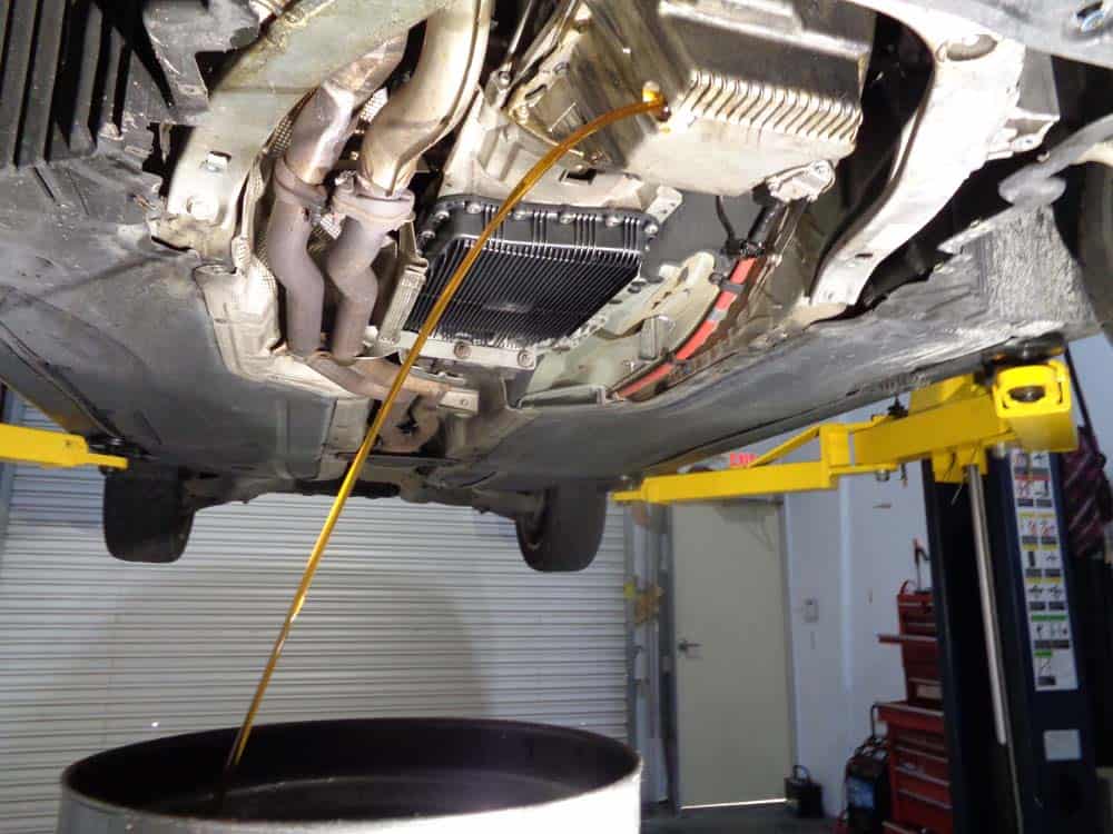 BMW E60 oil level sensor repair -drain the engine oil from the vehicle.