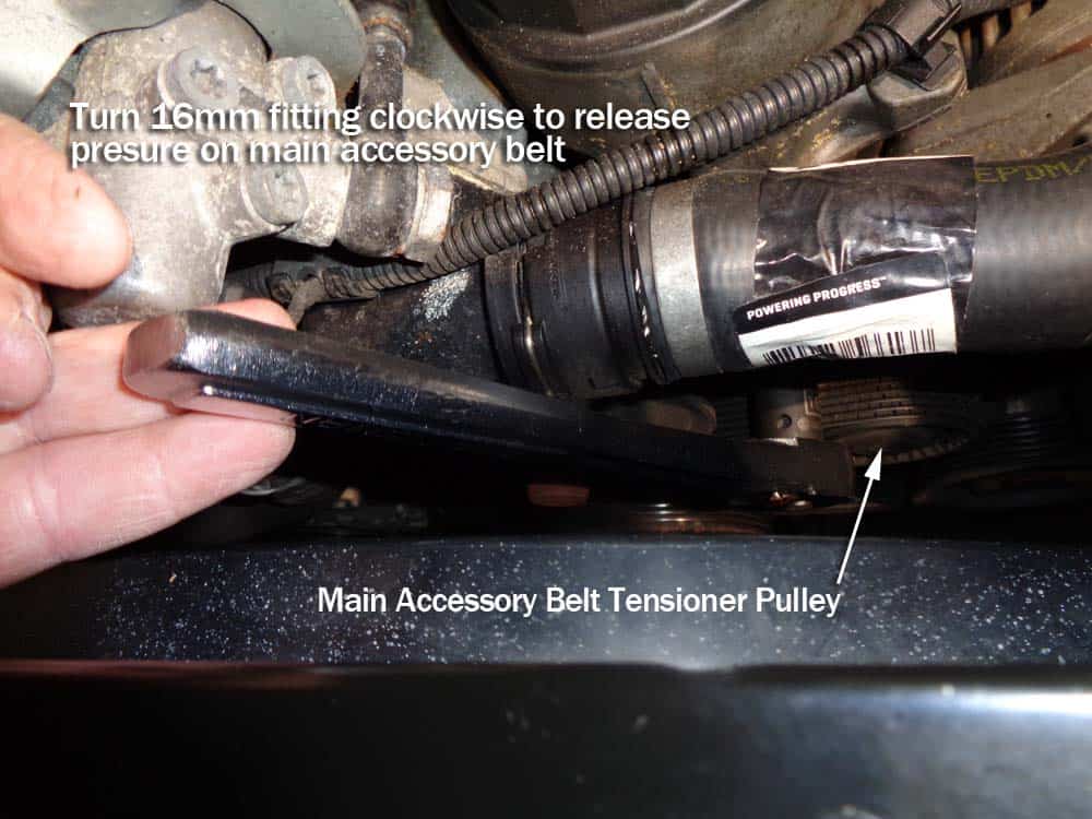 bmw e60 belt and pulley repair - Use a 16mm socket wrench to release pressure on tensioner pulley