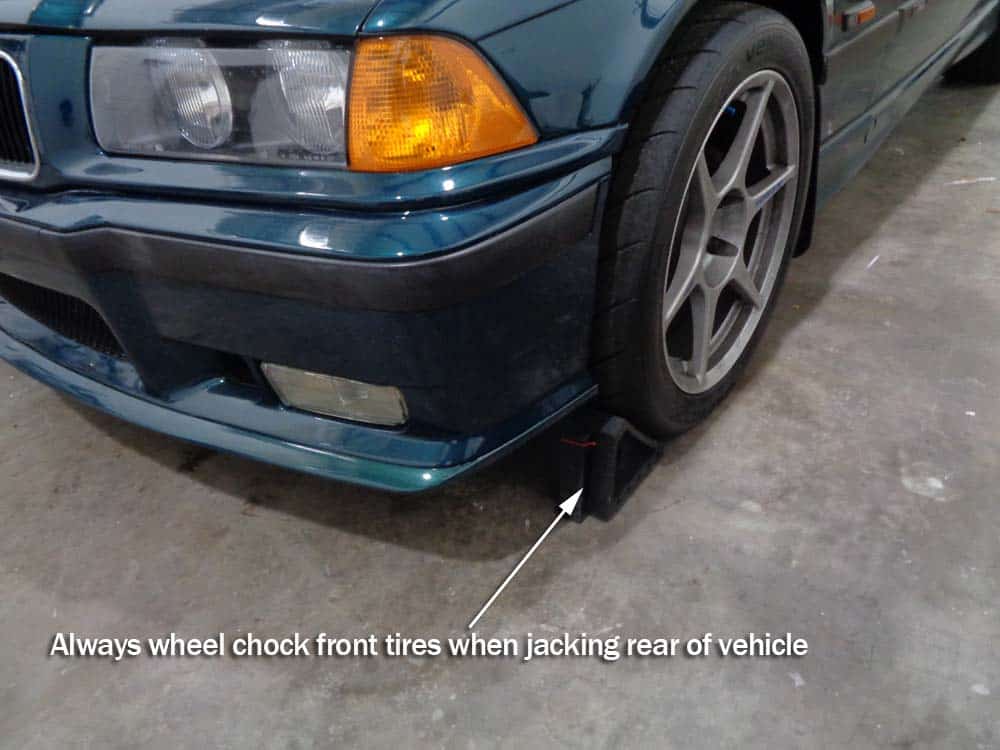 bmw jacking and supporting - Always chock the front wheels when jacking the rear of the vehicle.