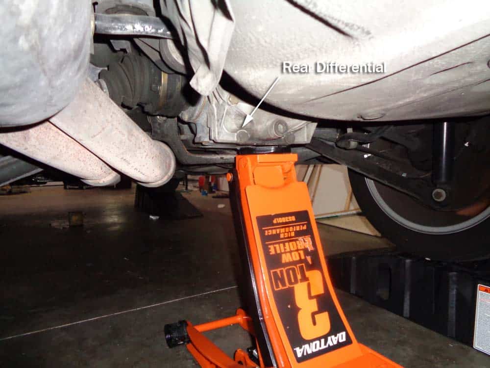 bmw jacking and supporting - Always place jack under differential when jacking up rear of vehicle.