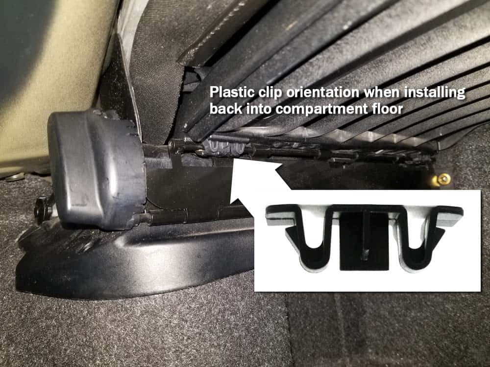 Proper plastic clip orientation when installing the compartment floor