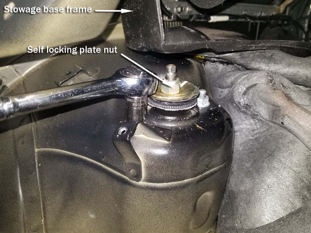 BMW E85 rear shock replacement - Remove the shock mounting nuts