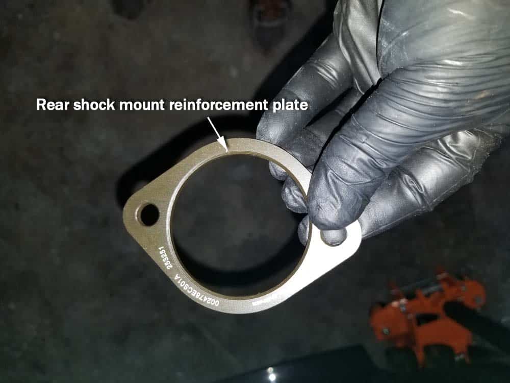 BMW E85 rear shock replacement - install new shock reinforcement plates