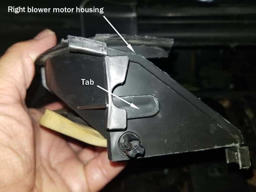 BMW E46 blower motor replacement - right blower motor housing tab
