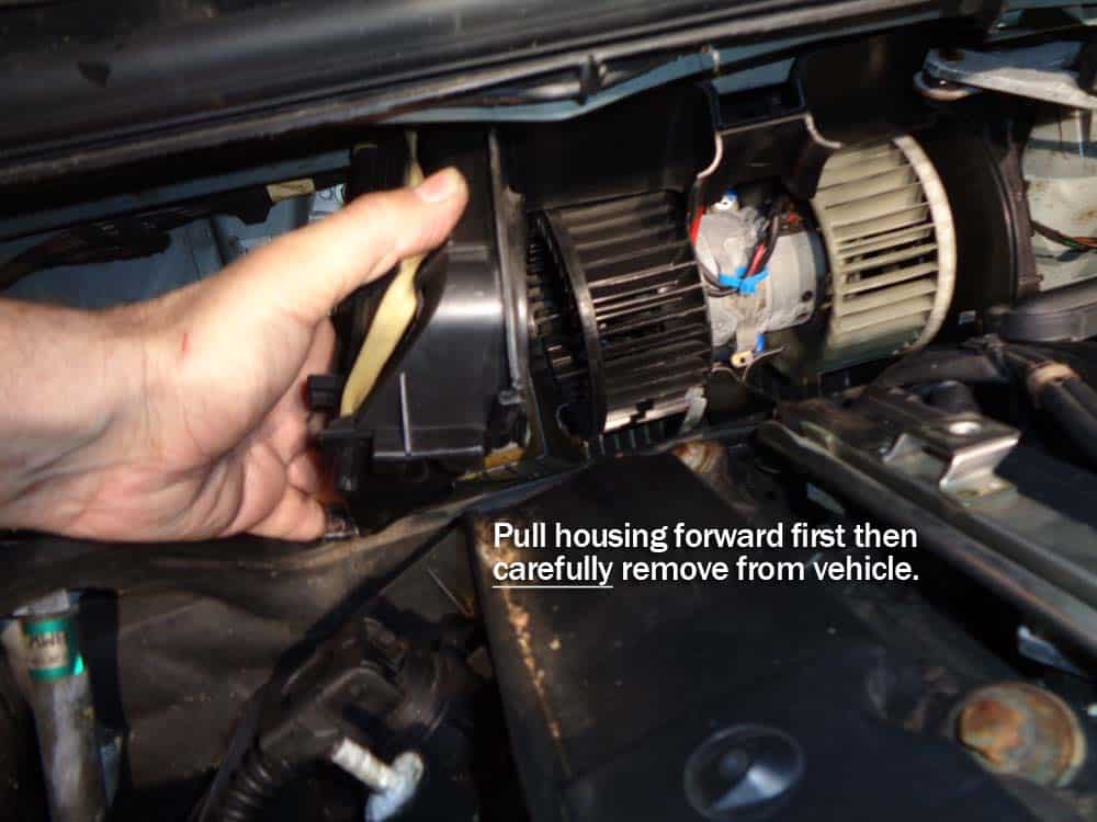 Pull the right side blower housing straight out from the vehicle.