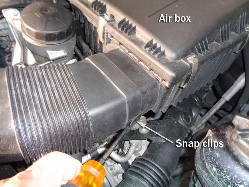 BMW E90 cooling fan - unsnap the intake duct from the air box