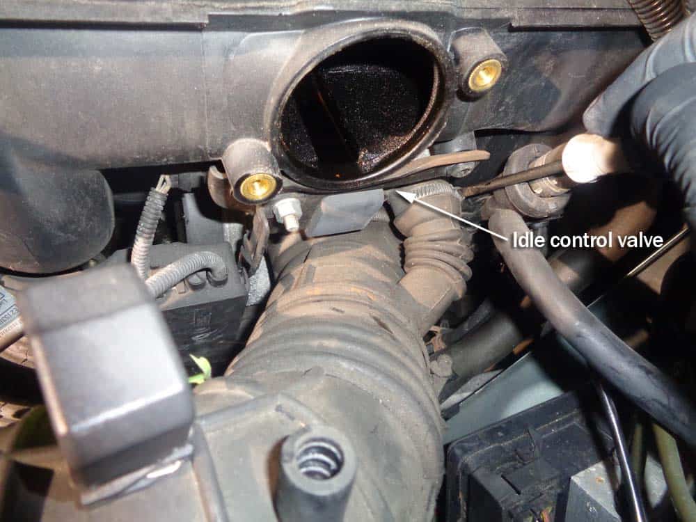BMW rough idle on startup - Remove the intake boot from the idle control valve