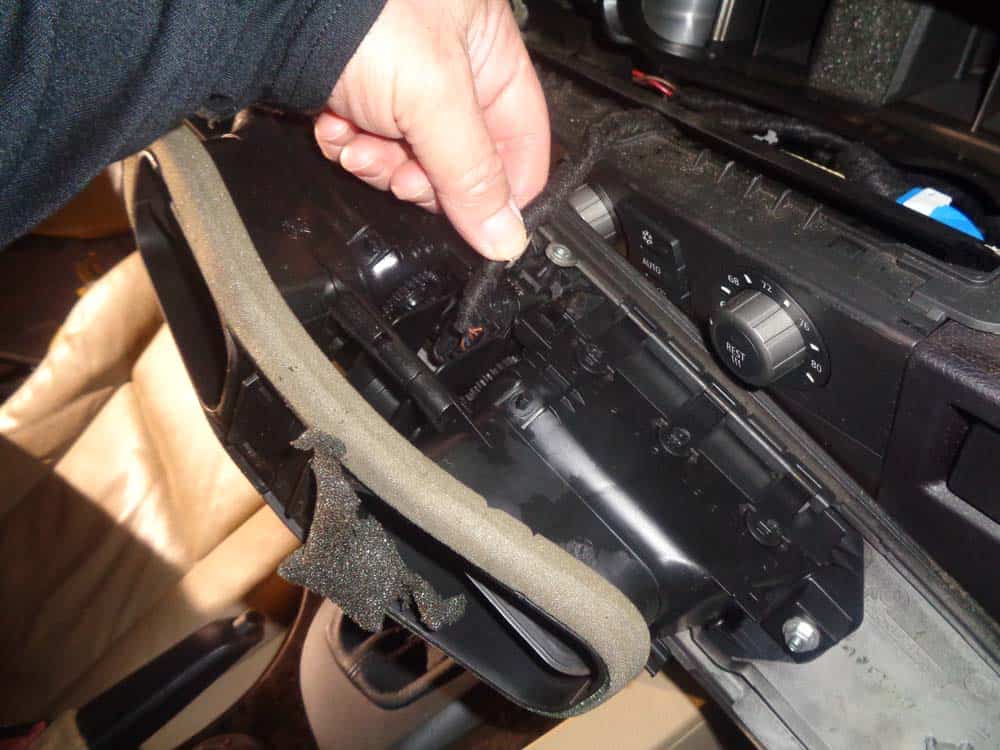 bmw auxiliary port - remove the electrical connection from the door lock switch