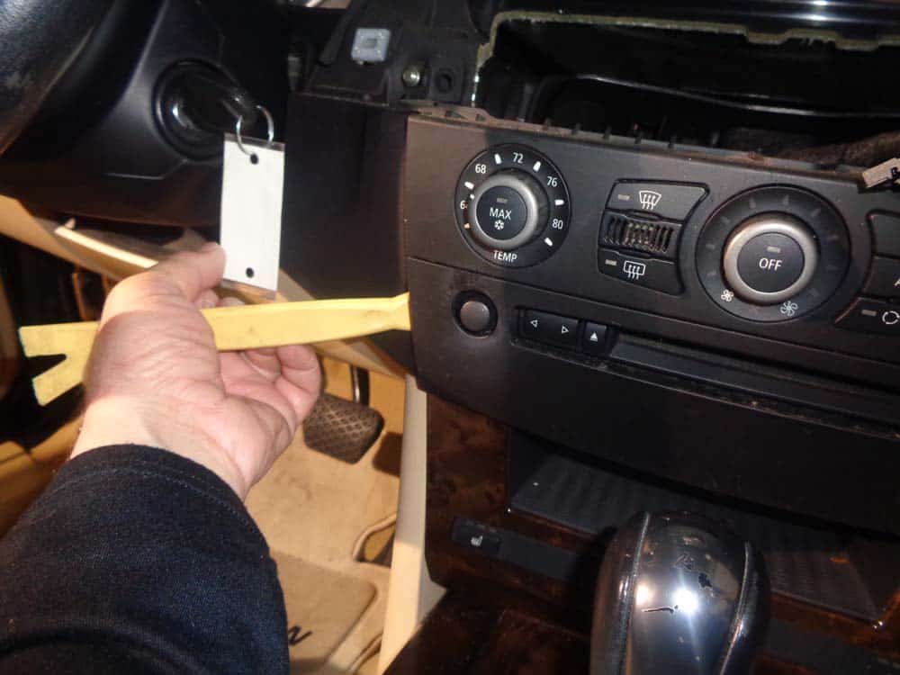 bmw auxiliary port - Use a plastic trim tool to pry the hvac control panel loose