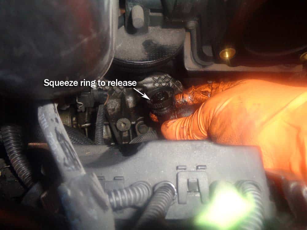 BMW E46 intake manifold - remove the dipstick ventilation hose form the PCV valve.