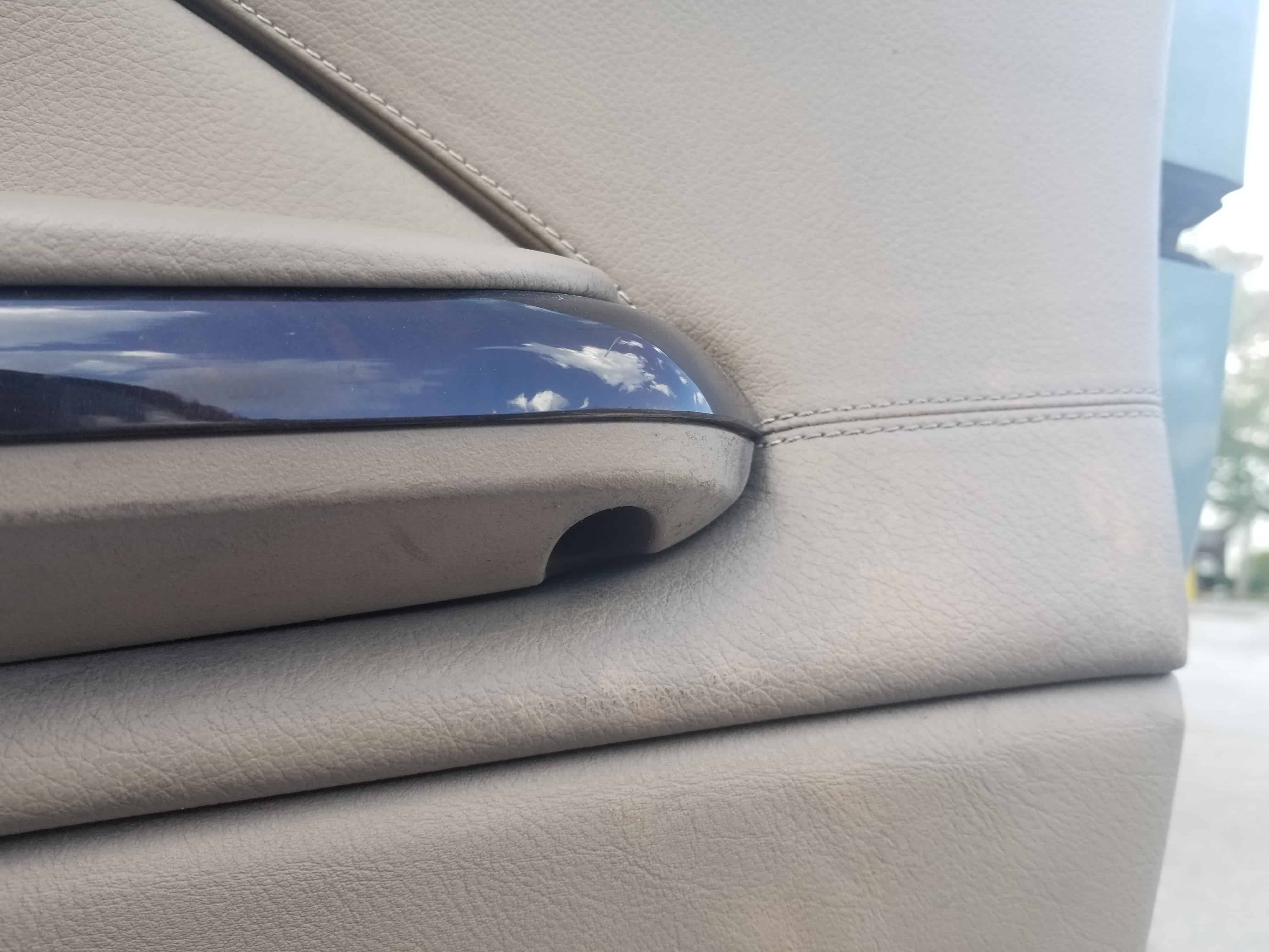 BMW E46 door speaker repair - remove the lower torx screw.