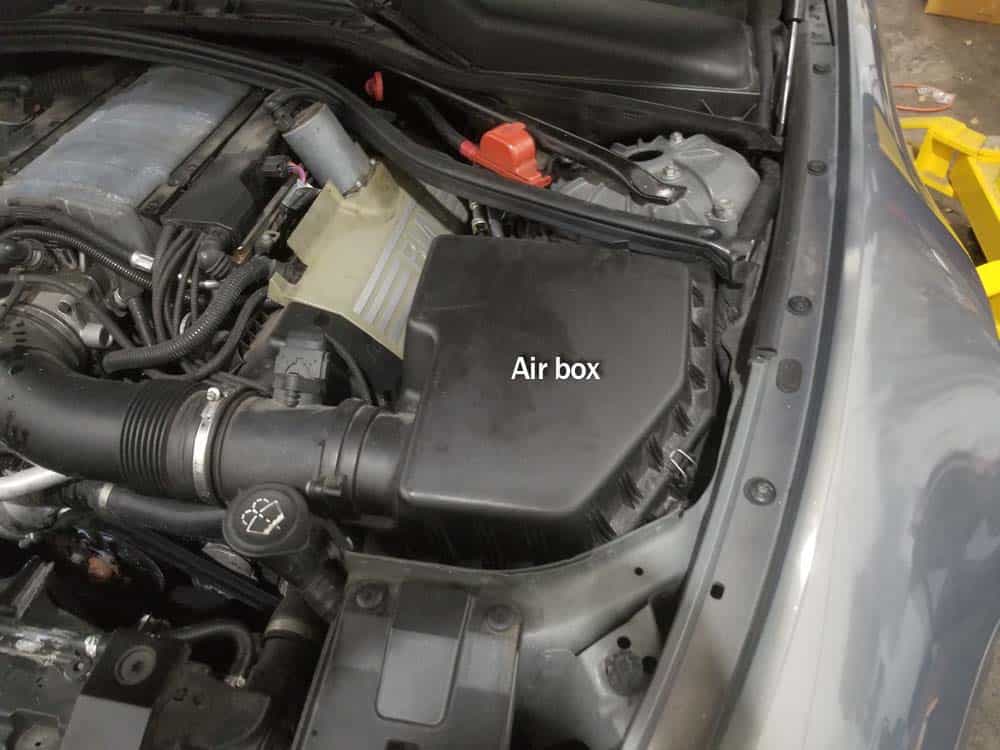 BMW E63 Air Filter - Locate the air filter box on the left side of the vehicle