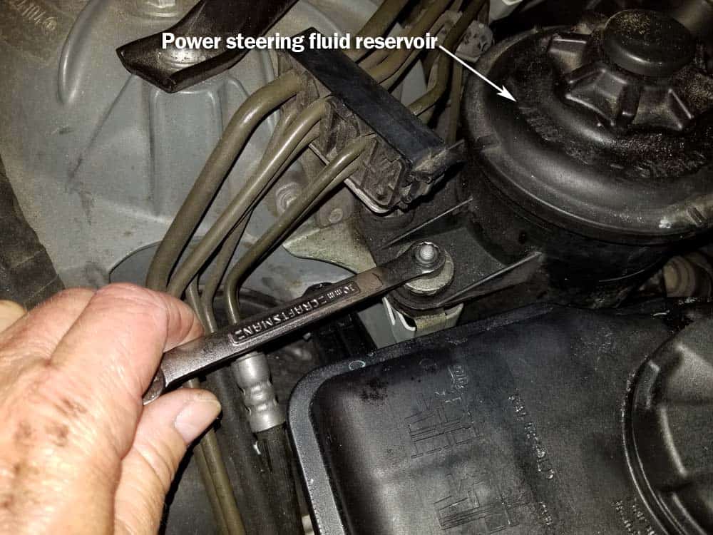 BMW N62 engine tune up - Loosen the power steering reservoir to access cylinder 1