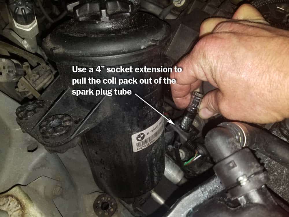 Use a socket extension if necessary to pull the ignition coil free.
