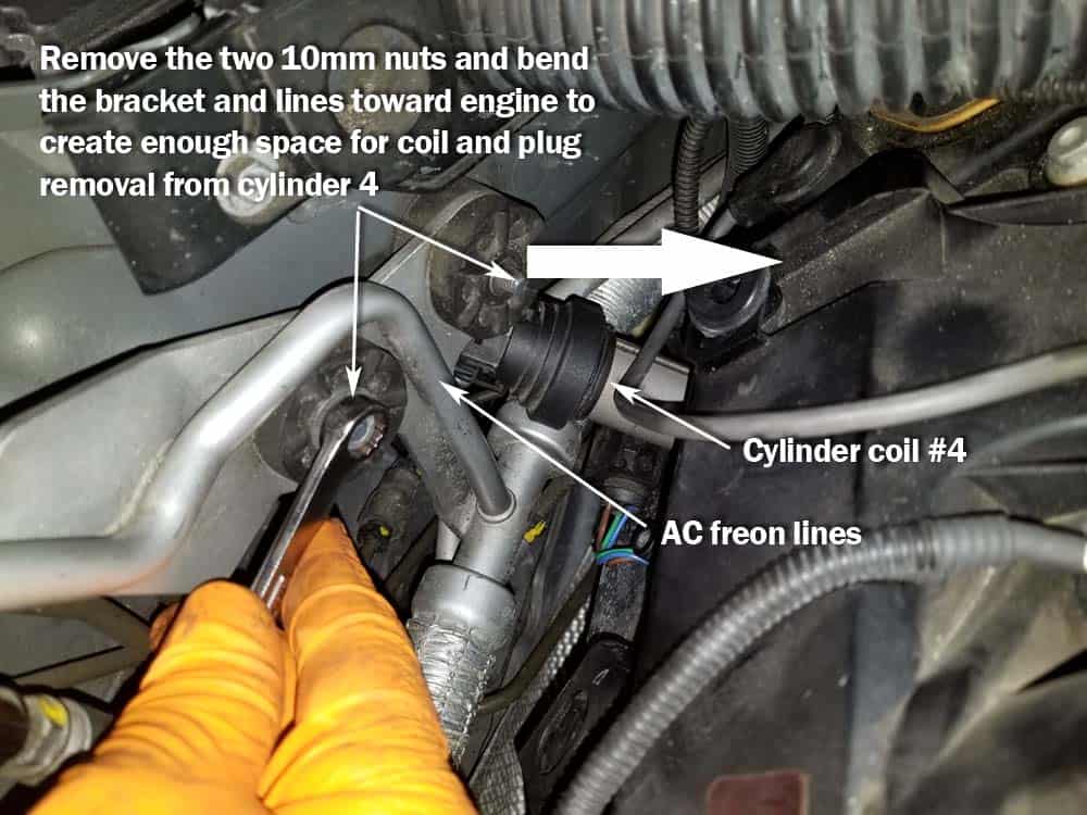 BMW N62 engine tune up - Cylinder 4 may require loosening the AC freon line bracket to gain access to the ignition coil.