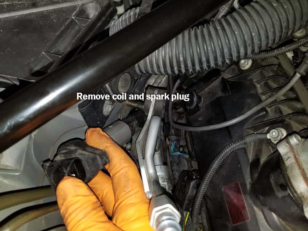 BMW N62 engine tune up - Remove the coil and the spark plug from cylinder 4.