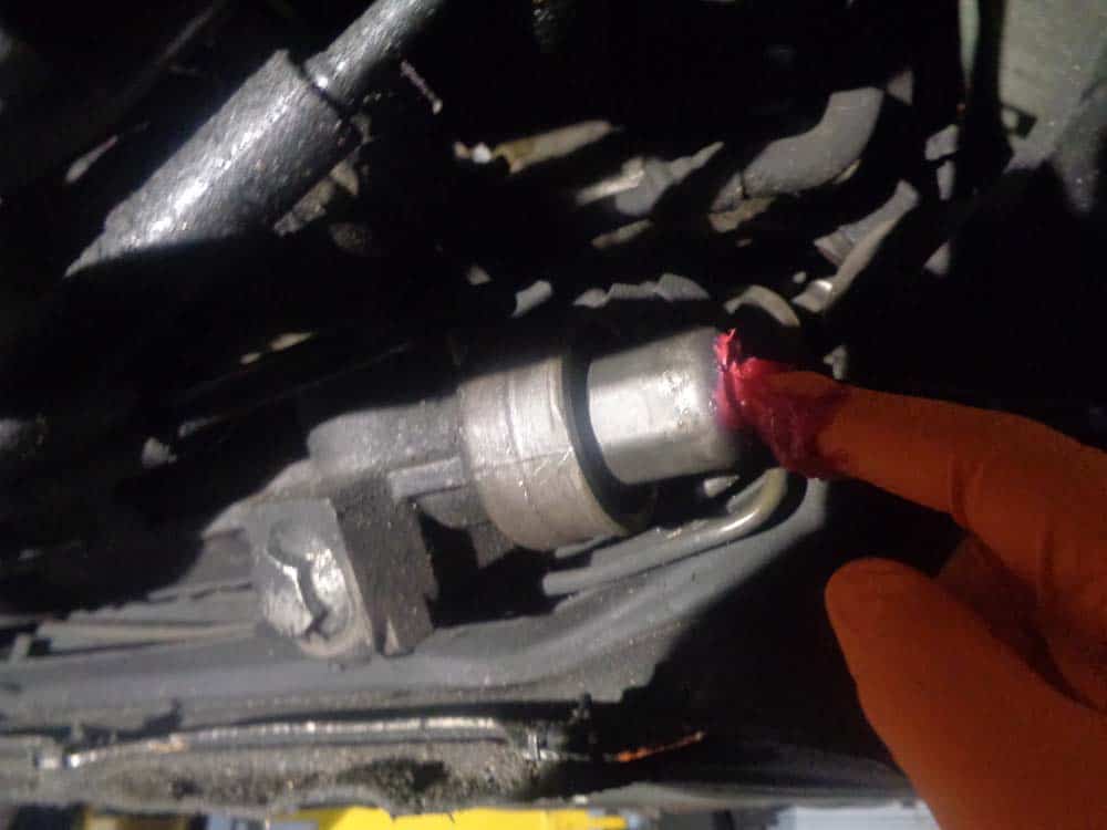 BMW E46 Tie Rod Repair - apply grease to inner tie rod ball joint.