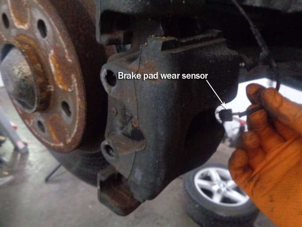 BMW E46 Brake Repair - remove the brake pad wear sensor