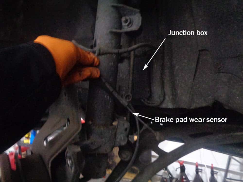 BMW E46 brake repair - disconnect the brake pad wear sensor