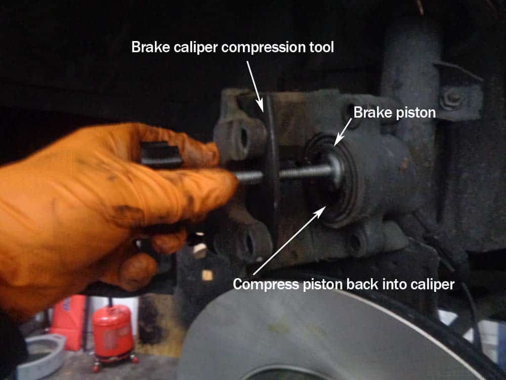BMW E46 Brake Repair - use a brake caliper compression tool to compress the brake piston