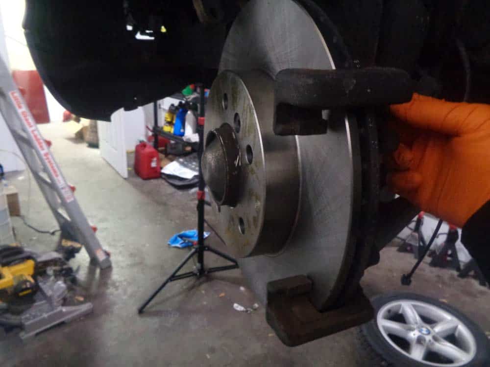 BMW E46 brake repair - reinstall the pad carrier