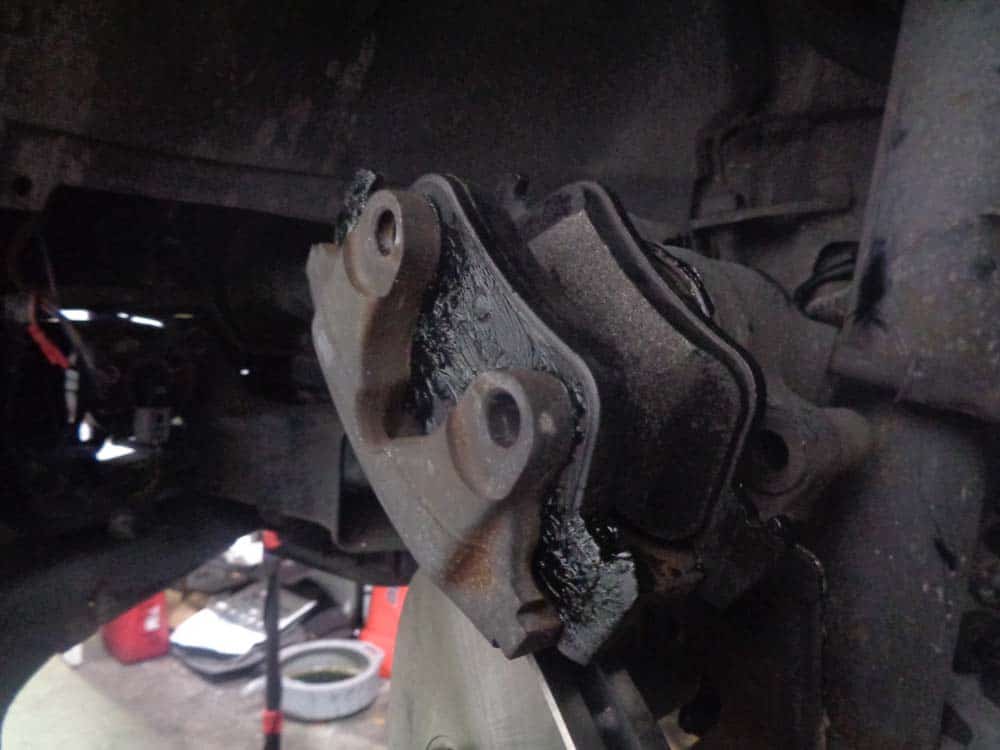 BMW E46 brake repair - install the new brake pads back into the caliper