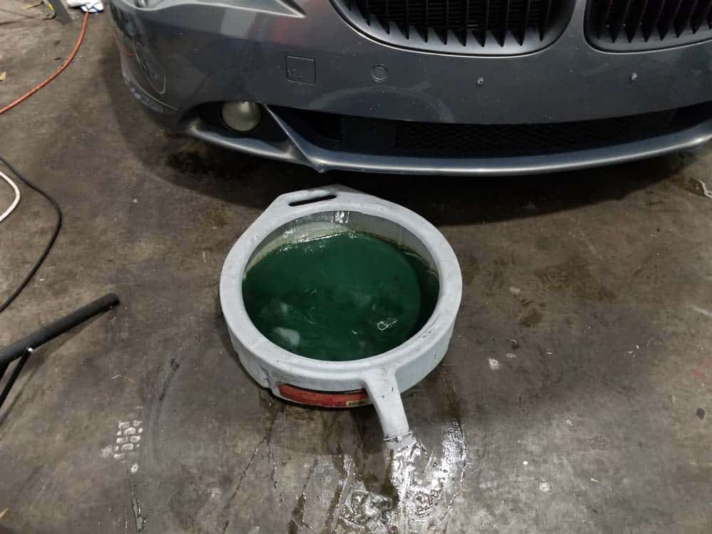 bmw coolant expansion tank replacement - Position a 5 gallon drain pan under the reservoir 