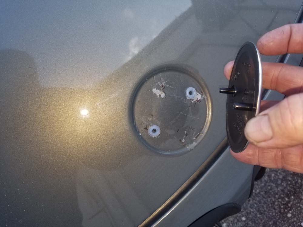 BMW 645ci emblem replacement - Install the new hood emblem