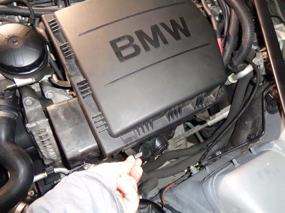 BMW N55 Fuel Injector Replacement - Unsnap the clips on the air cleaner assembly