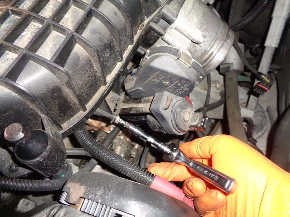 bmw high pressure fuel pump - Remove the T25 screws anchoring the valve bracket.