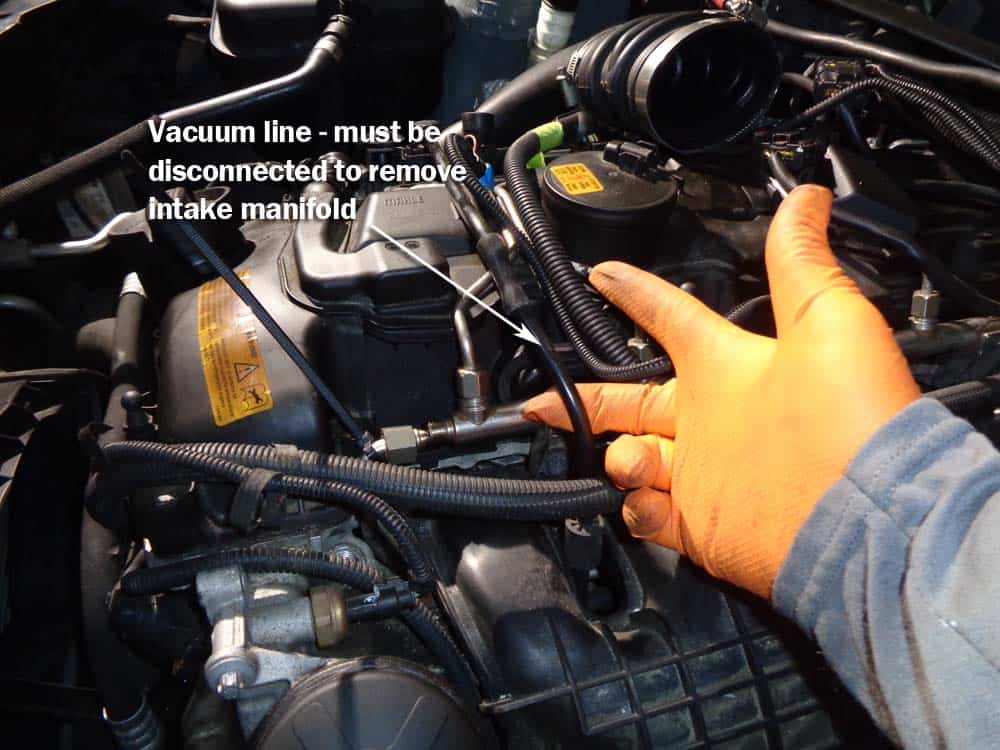 bmw high pressure fuel pump - Locate the auxiliary vacuum pump line.