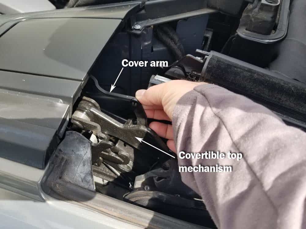 Disconnect the cover arm