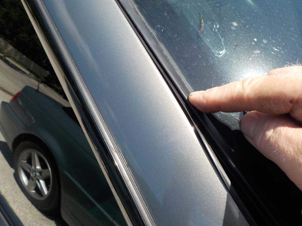 Install the new rubber moulding into the side of the windshield.