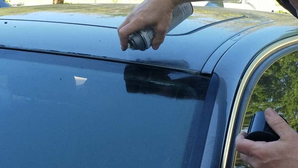bmw windshield moulding replacement - Liberally spray the old adhesive with 3M Adhesive Remover