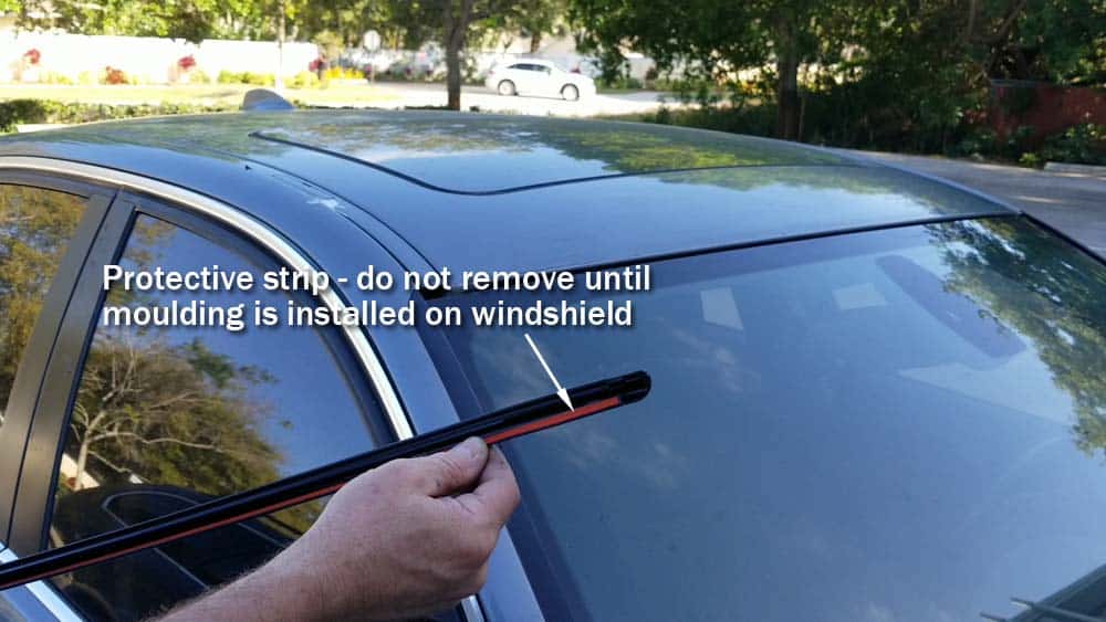 bmw windshield moulding replacement - Do not remove the protective strip until moulding is installed