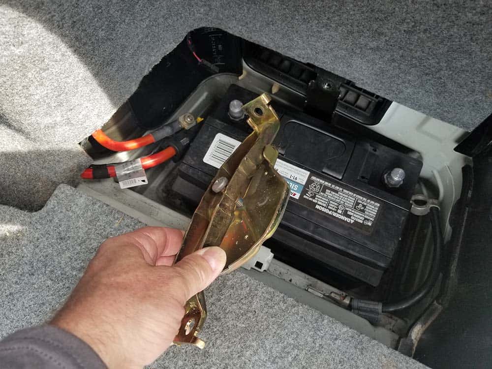 bmw e46 battery replacement - Remove the roll-over bracket from the vehicle