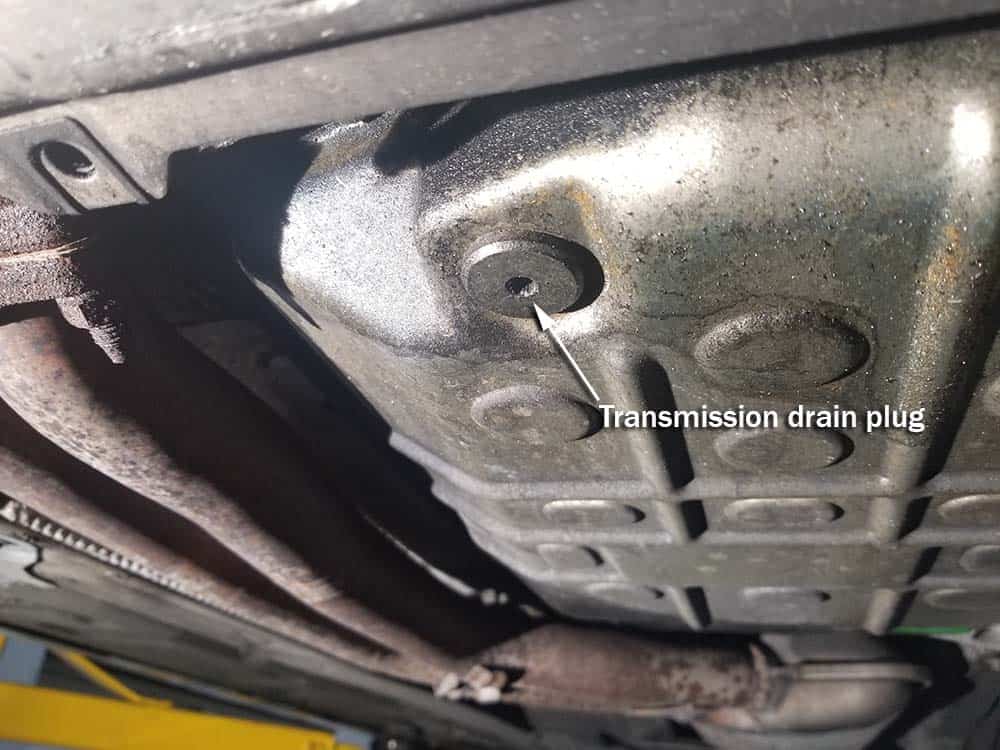 BMW 5HP19 solenoid replacement - Locate the transmission drain plug.
