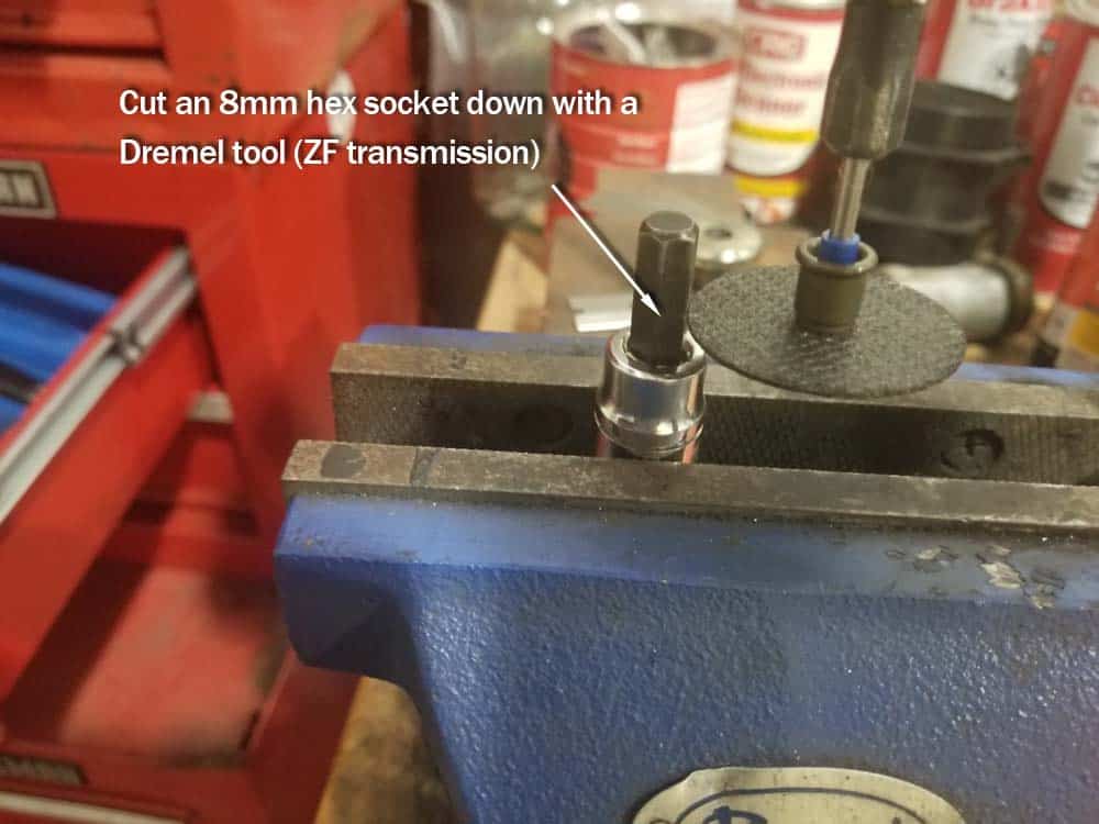 Make a custom 8mm hex socket to remove the fill plug.