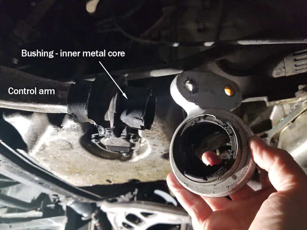 The metal bushing core sometimes remains on the control arm