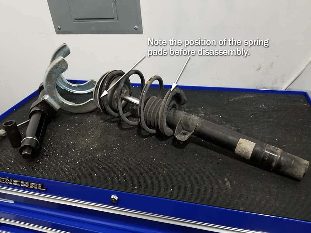 bmw e46 strut replacement - locate the position of the spring pads
