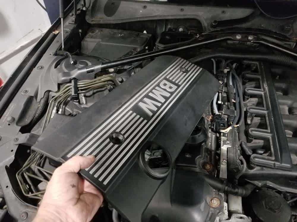 Remove the right engine cover