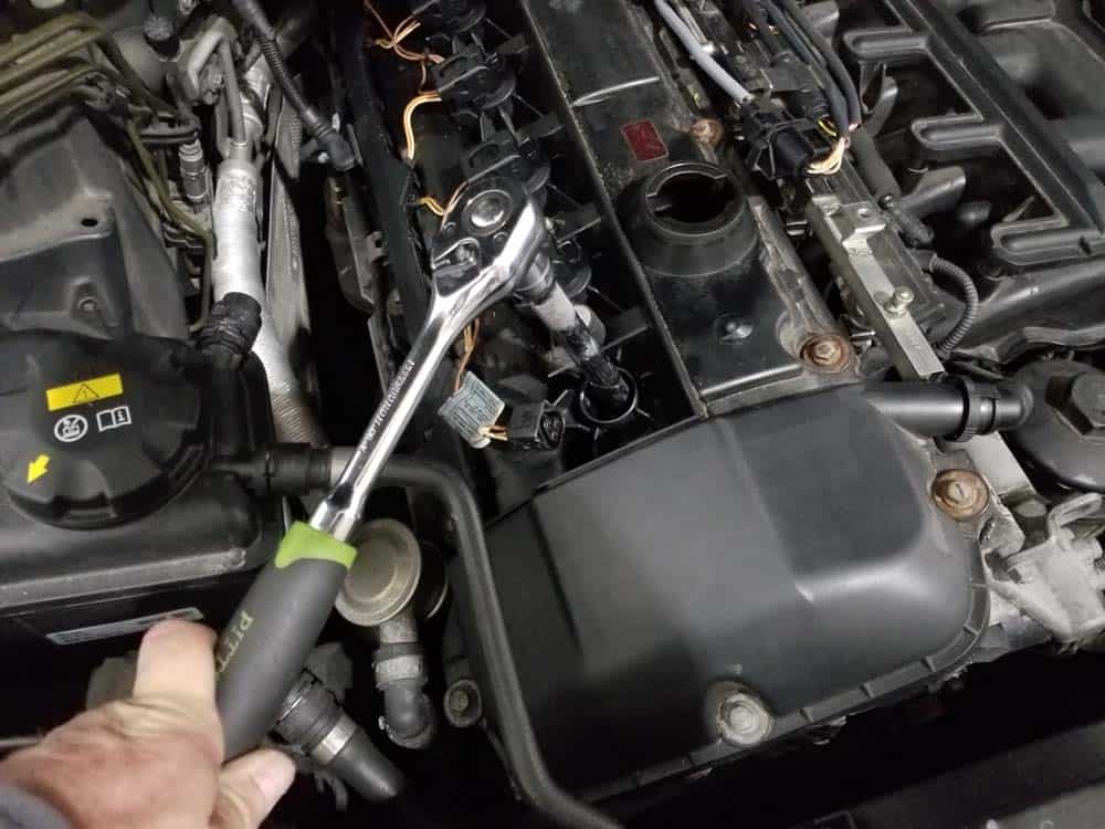 BMW E60 Tune Up - Use a spark plug socket to remove the spark plug